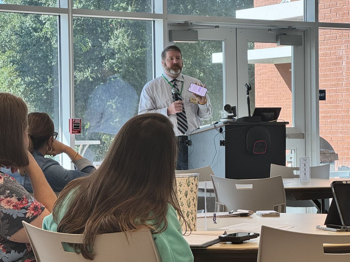Dr. Lane Freeman leading a workshop for educators